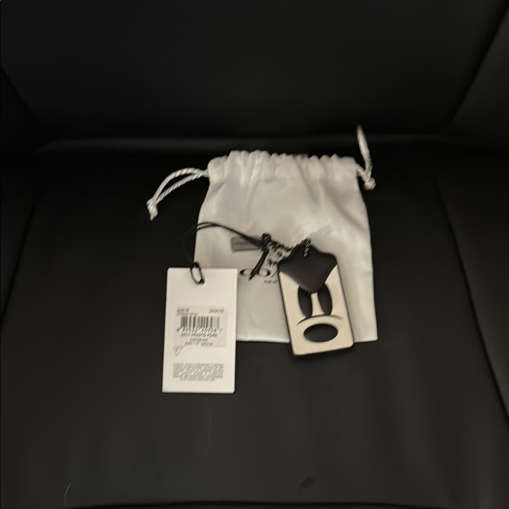 Coach Black Tag with White Pouch
